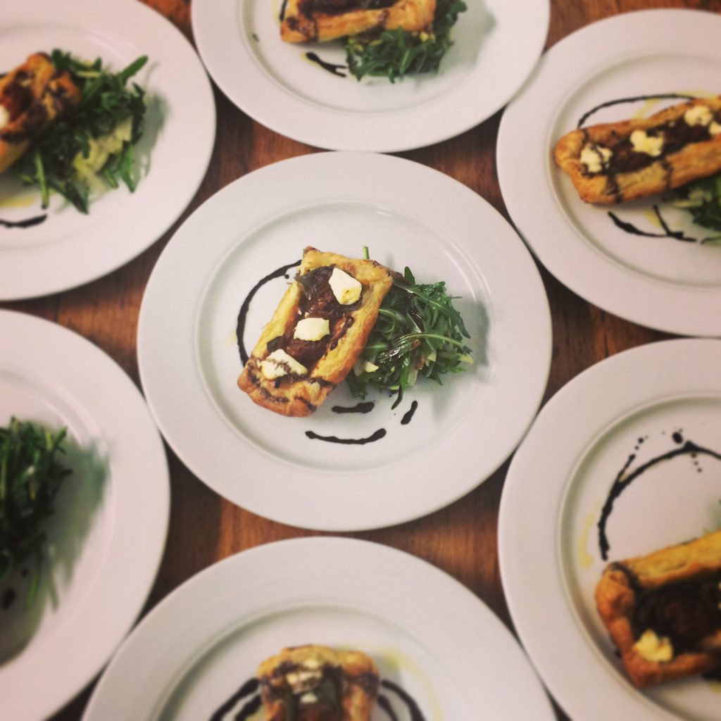 Caramelised onion & Meredith goat cheese galette with pear & rocket salad