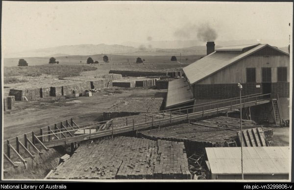 Bricks stacked at the Canberra Brick Works, Yarralumla by Harry Connell, courtesy of National Library of Australia. Part of the collection: Photographs of the construction of Canberra, 1913-1917.