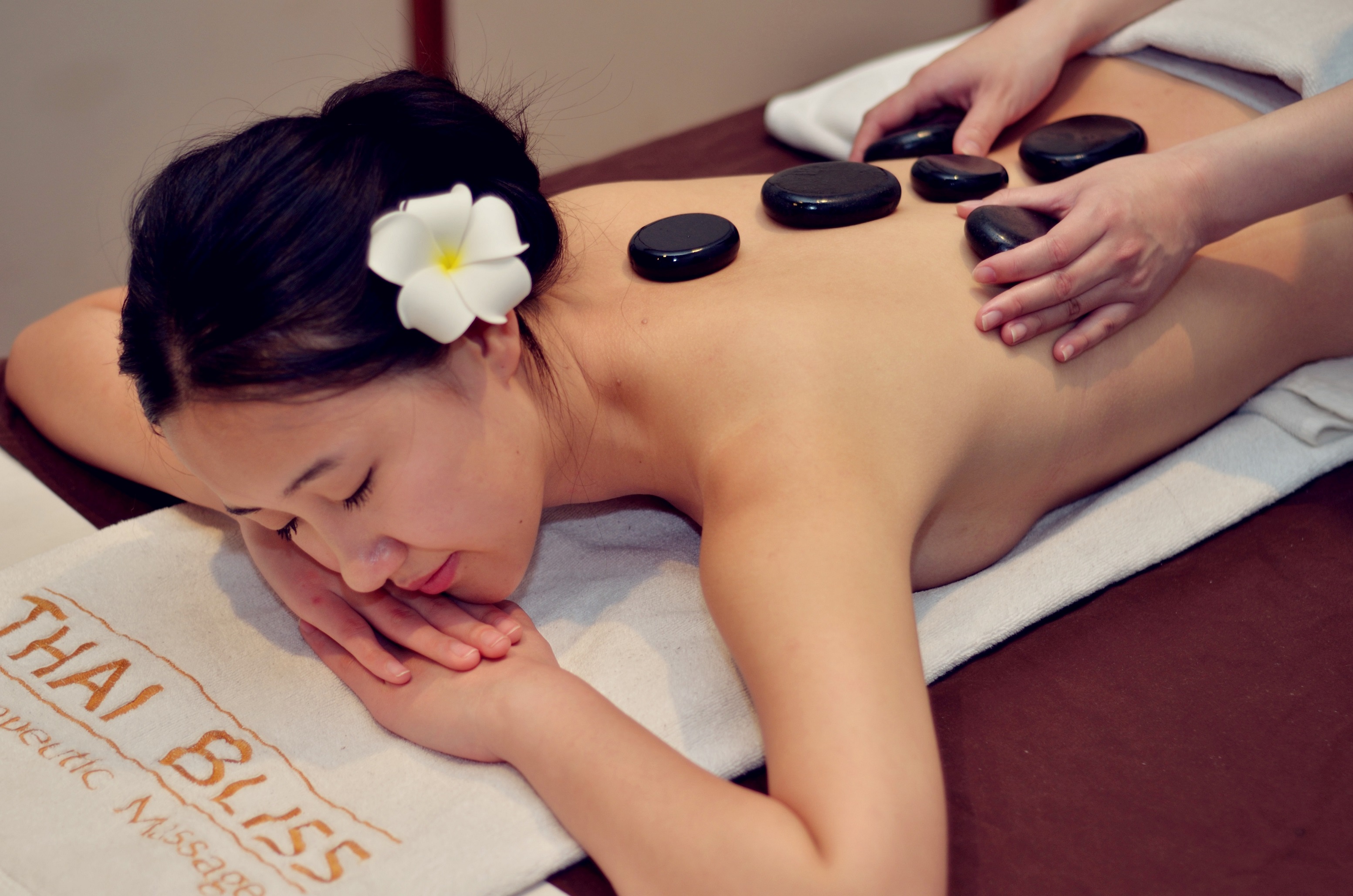 The stone massage with hot oil.