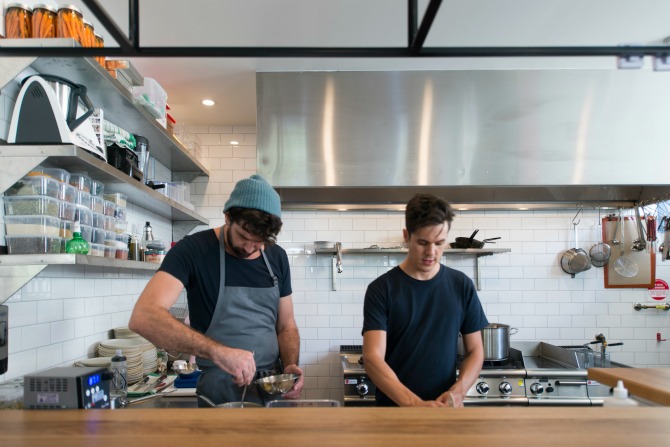 Ian (right) in the kitchen. Photography by Martin Ollman